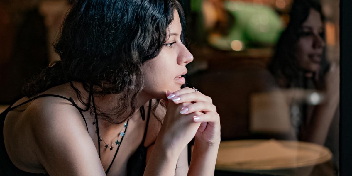 A person looking out with a thoughtful, inspired expression, representing the shift in perception after gaining new insights.