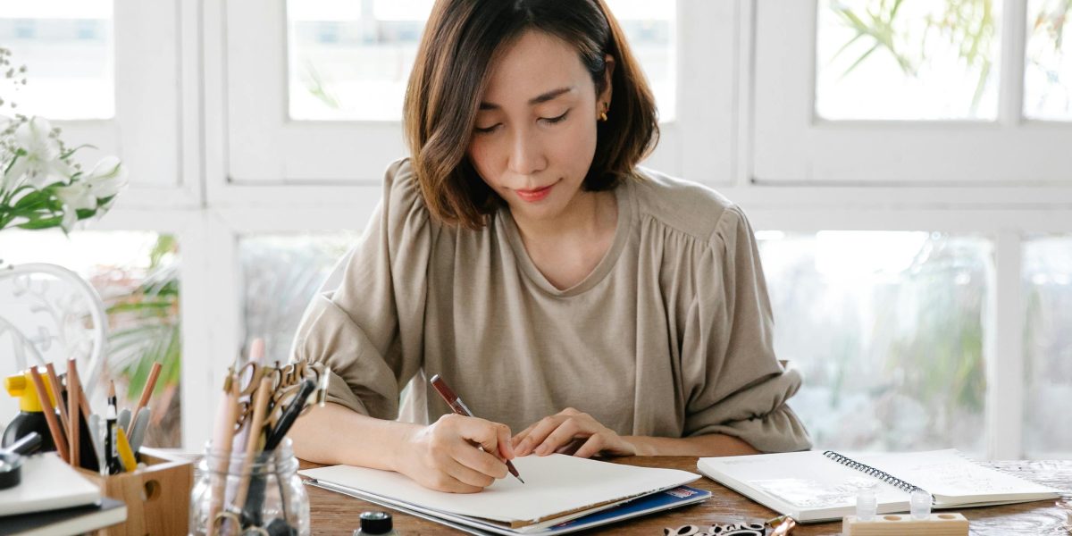 An individual deeply focused on honing a craft, symbolizing Mary Elizabeth Winstead's early dedication to developing her unique comedic style.