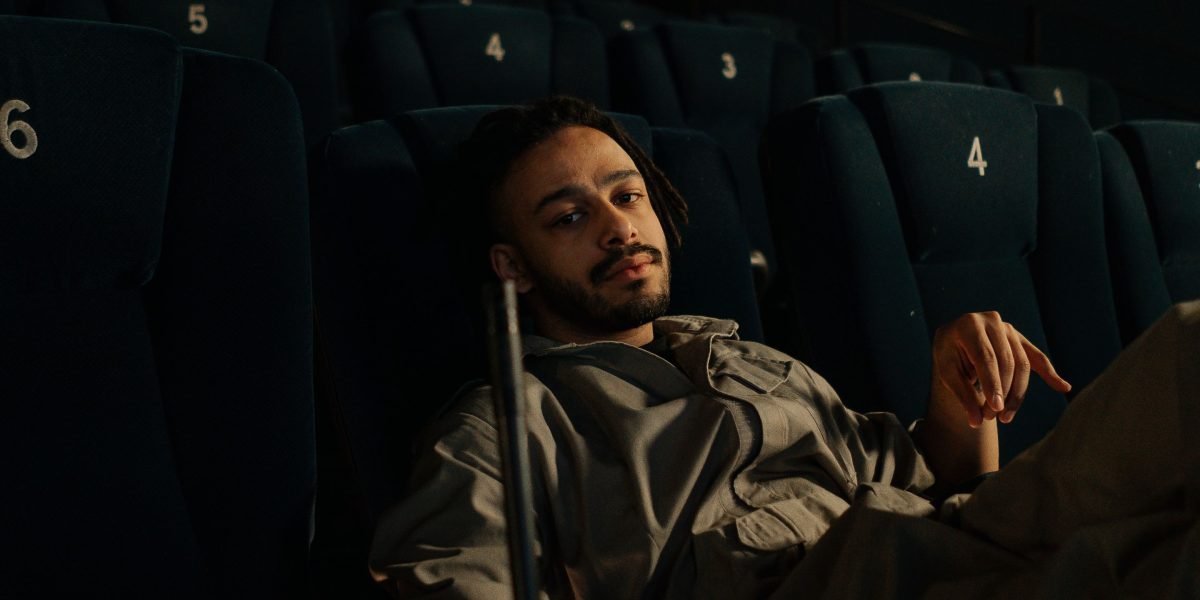 A person confidently browsing options, symbolizing the reader discovering new cinematic interests.
