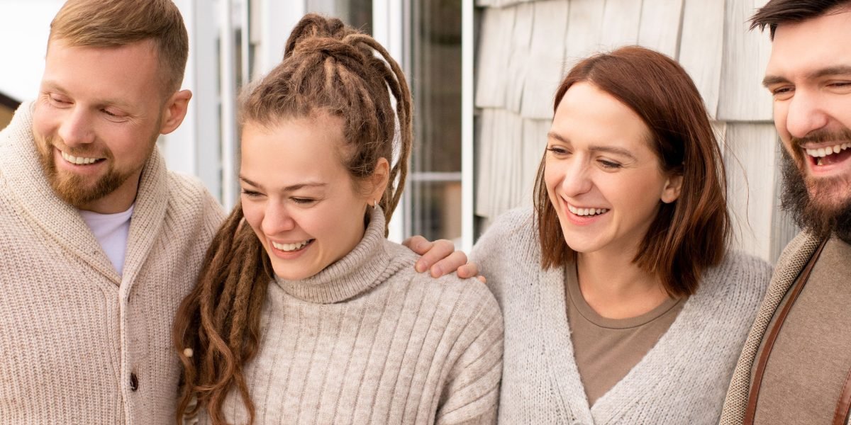 People sharing a moment of laughter, demonstrating how humor can evoke collective emotional responses.
